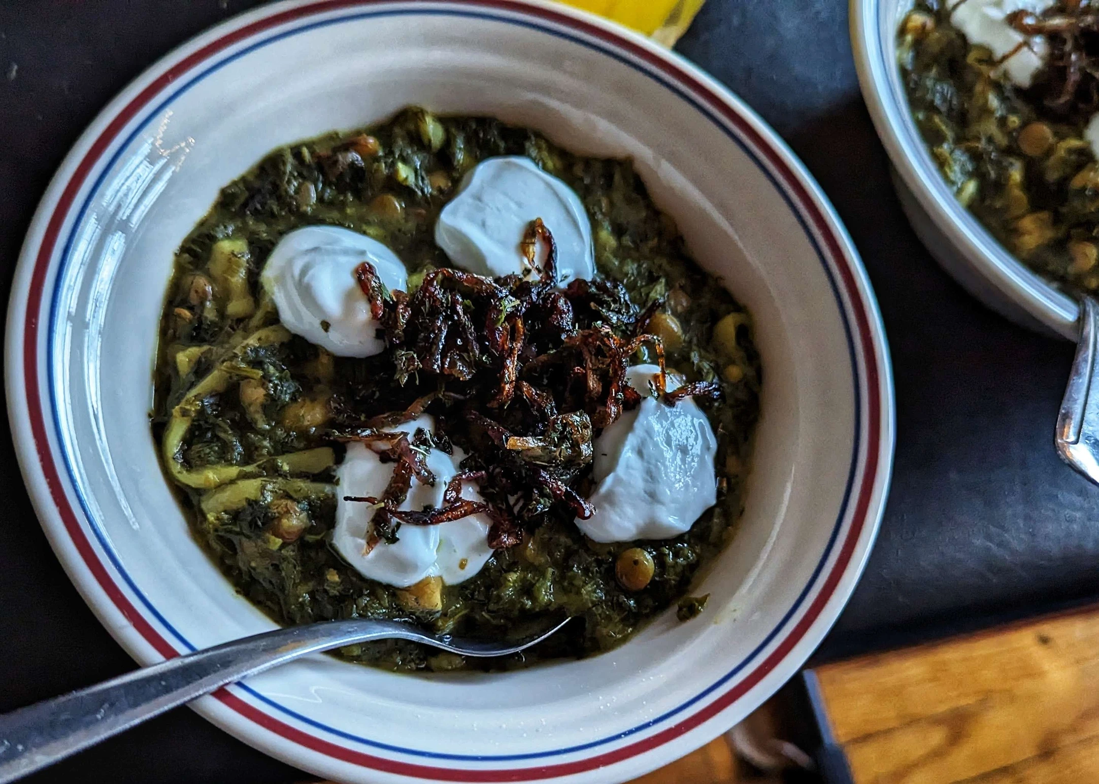 Ash reshteh made for Nowruz in 2023. A friend suggested that authentic 'reshteh' makes the dish, but I lacked them this year. I found <a href=https://www.noghlemey.com/nourish/2017/1/13/reshteh-persian-noodle>this</a> recipe to make them from scratch and it was fantastic!