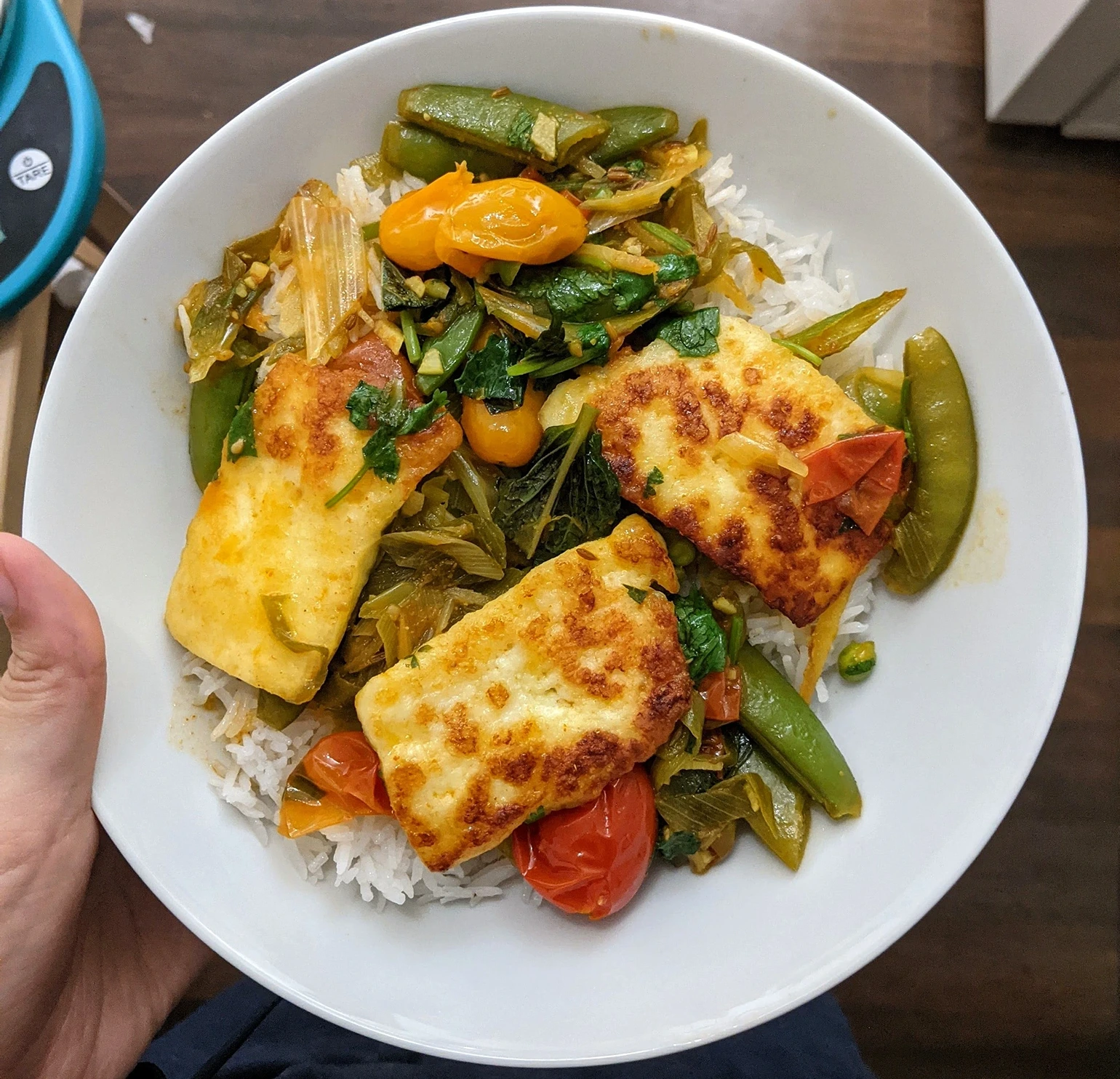 A sort of 'whole' version of matar paneer, from <a href=https://www.bonappetit.com/recipe/paneer-with-burst-cherry-tomato-sauce>Sohla's recipe</a>.