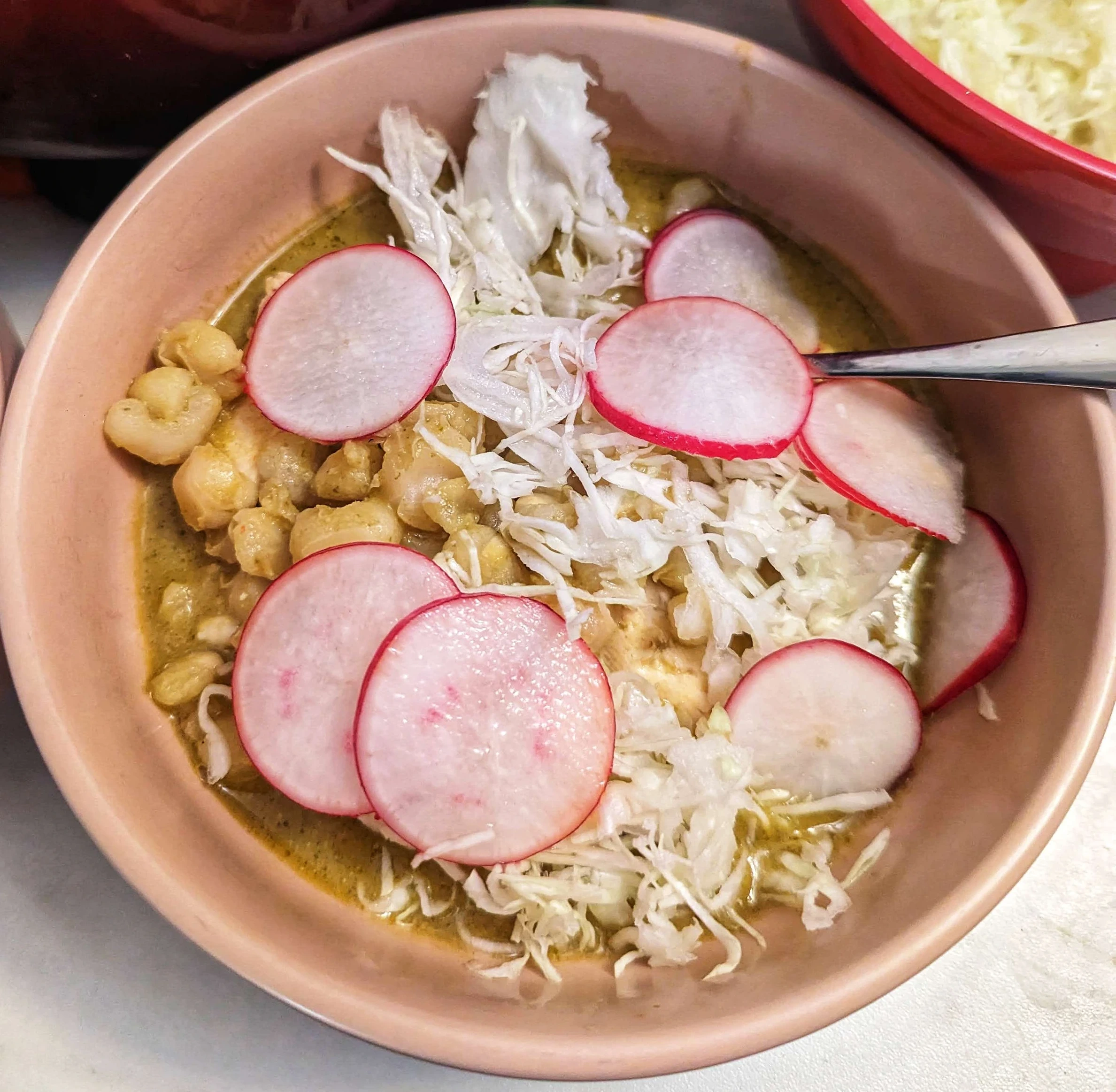 Pozole verde, made from the recipe in  Edgar Castrejn's book, 'Provecho'. I needed to use up radishes from the pozole rojo.