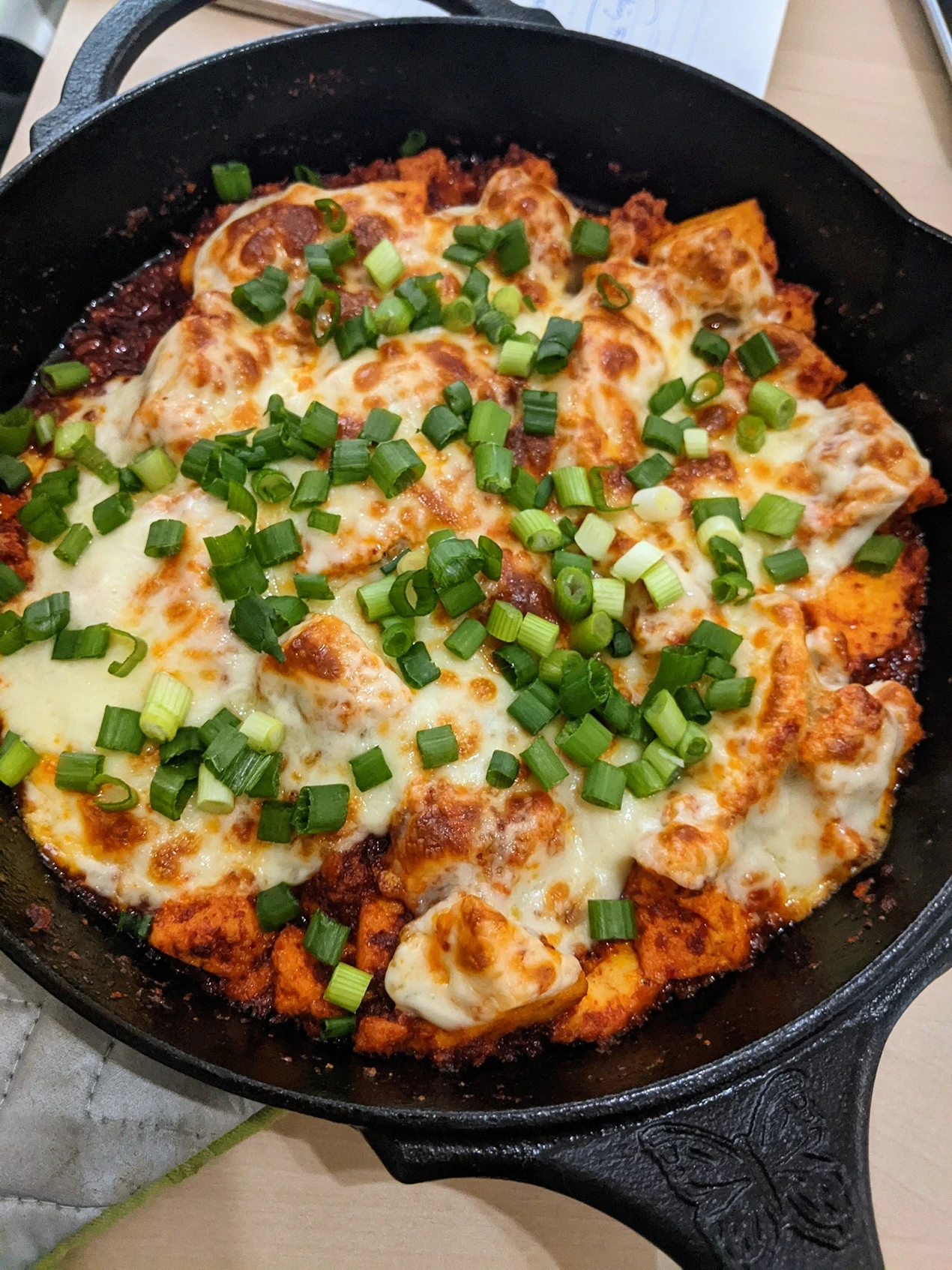 Tofu buldak. A spicy and cheesy comfort food dish from Korea.